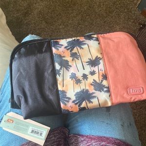 Lug Cosmetic Pouch in color Sunset Brand New asking $25